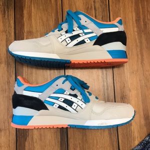 Men’s ASICS multi color tennis shoes size 10